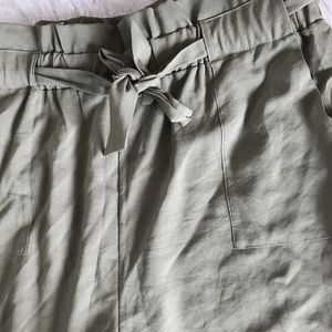 Olive green paper bag pants.